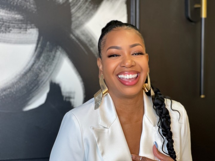 Life coach Charisse Floyd seated for a portrait